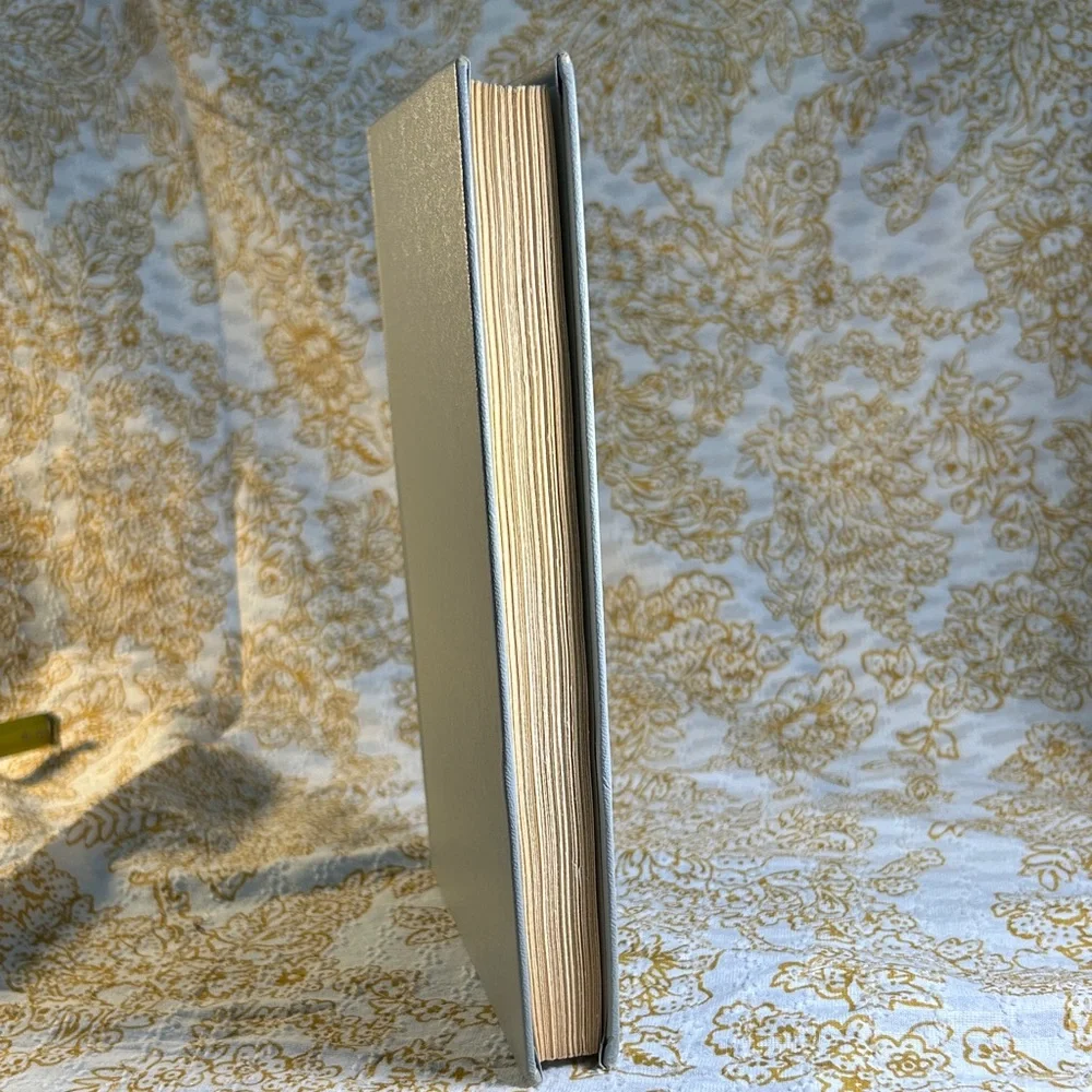 White Hardcover Book with Red Text - Picture 3 of 5